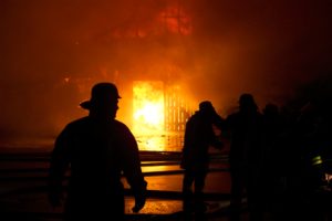 fire fighters extinguishing a fire