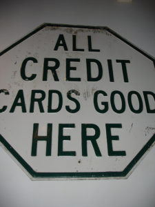 Sign: "All credit cards good here"