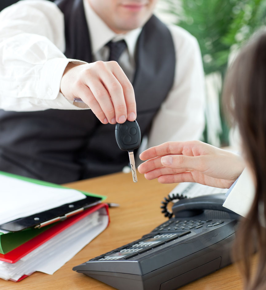 Business scenario: employer handing key to car to employee