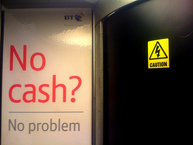 Text: "No cash? No problem. Caution!"